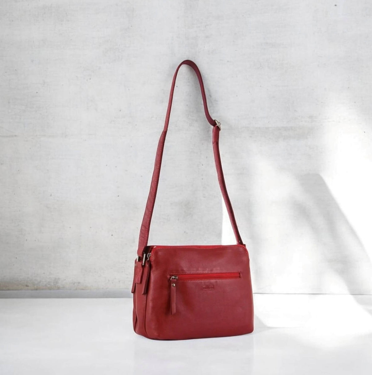 Milleni Ladies Nappa Leather Crossbody Bag in Red